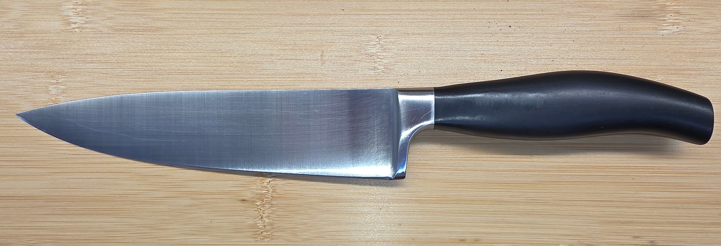 Chef knife after bolster reduction, heel repair, and sharpening