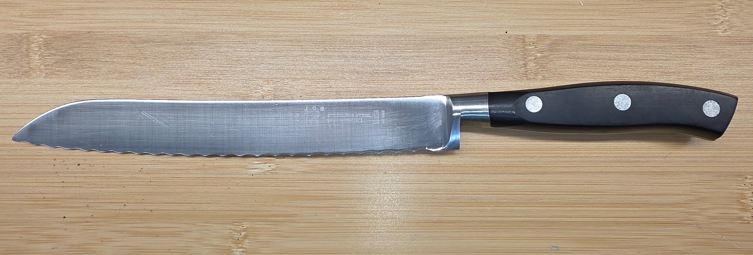 Henckels bread knife back side after sharpening